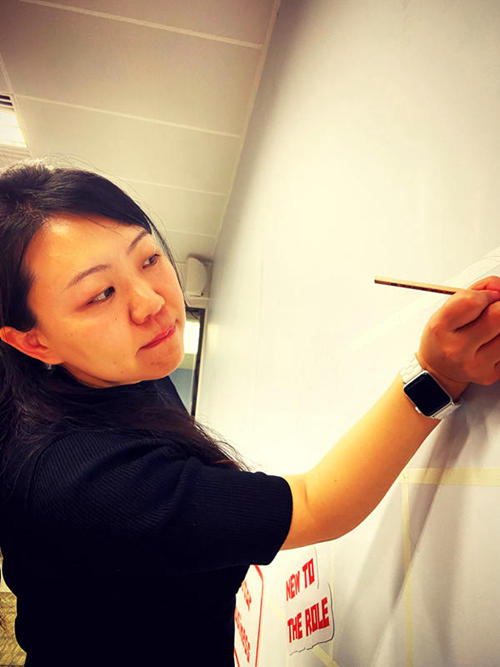 Phoebe drawing the wall
